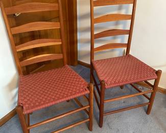 A pair of lovely Shaker style ladder back chairs w/cloth woven seats. 