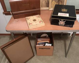 A fantastic singer sewing machine (See previous pictures) more smalls and a great wooden topped table! 