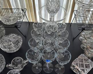 Here is s STUNNING set of crystal wine glass with a beautiful design. The LARGE vas at the top center is signed WATERFORD! 