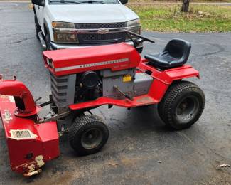 14HP Kohler, 513cc, single cylinder, gasoline engine. Sundstrand, hydraulic transmission. Two
speed differential. This machine does not have an hour meter. Manual steering. Electric PTO
clutch. Includes original Massey 48β mid-mount mower, digital format shop manual, and
Harvester International, single stage, snow thrower. The snow thrower has been adapted to the
tractor.
This machine was partially restored in the 1990s. The single spool hydraulics operate but need
attention. A new fuel pump has been installed along with a new air filter, spark plug and some
fuel line. The carburetor was cleaned and new float needle valve installed. The modified
electrical system was cleaned up and is working. Great tractor for restoration!