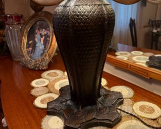 Signed QUOIZEL Table Lamp with Leaded and Stained-Glass Floral Shade Lamp on Ornate Peacock Feather Bronze Base