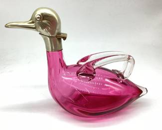KIHE100 Karl Polada Czech Cranberry Duck Decanter Vintage. Silverplate over brass, head. Measures approximately 8" long 6" tall. 
