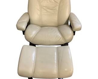 BRDA708 Stressless Recliner And Ottoman Chair was manufactured in Norway.  The creamy cover has several scratches especially around the head rest area but there is a zipper where the cover can be removed. 
