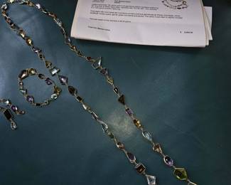 18kt long gemstone necklace with matching earrings and bracelet...we have GIA certs for these