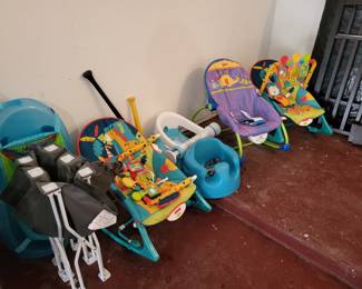 Baby carriers, chairs and stroller.