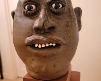  Face Jug: by Lanier Meaders (1917-1998) His technique utilized a Tabacco Spit Glaze.