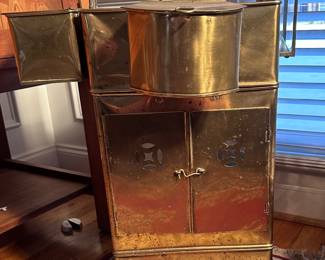Marvelous mid-century hexagon-shaped noodle cart. These are uséd by Asian street vendors to serve noodles and dumplings. In beautiful brass, this square cart main doors that open to the base that holds the hot coals to keep the food warm. The top of the cart is open and is uséd to hold toppings and condiments. 5 sides of the cart has framed glass. There are also 3 containers that have brass hooks to hang from the open top of cart to hold additional condiments and toppings.