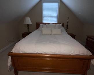 8 Piece Oak Lexington Queen Six PC  Bedroom set. Excellent Condition. 
Queen Bed w clean mattress 
Pr of nightstands 
Triple Dresser w Triple Mirror. 
Desk and chair
Bookshelf 
