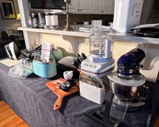 Variety of kitchen appliances-kitchen aid, food processing, new toaster, George Forman grill, new t-fal pressure cooker. 