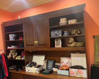 Designer scarves and bags available for purchase during in-person shopping on Friday and Saturday.