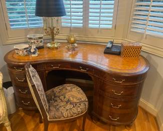 $480. Mainland -Smith kidney shape nine drawer desk. Desk measures 63.75 inches wide by 32 inches deep by 30 inches high. Chair shown sold separately in the following photos. Available for online purchase per the instructions on the sale details page, pickup is during in-person shopping hours.