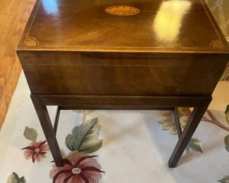 $160. Small inlaid wood box side table by Baker. 14.25 inches wide by 10.25 inches deep by 17.25 inches high. 
 Available for online purchase per the instructions on the sale details page, pickup is during in-person shopping hours.