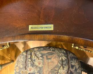 Photo of the center drawer with the logo inside                               