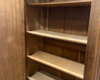 an interior view of the antique armoire