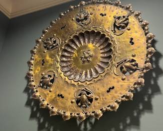 Brass art - hang or place on a table.   26" diameter .  For sale during in person shopping Friday & Saturday.