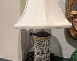 Pair of painted ceramic based lamps.  14"h.  For sale during in person shopping hours only.