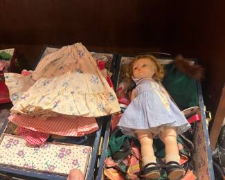 Vintage Madame Alexander "Alex" dolls with their clothing and carrying case. available for purchase during in-person shopping on Friday and Saturday.