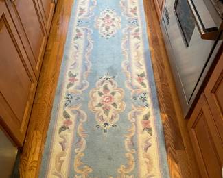 One of a pair of Serena hand tufted rugs.  100% wool pile 2'3" x 12' Persian Blue.