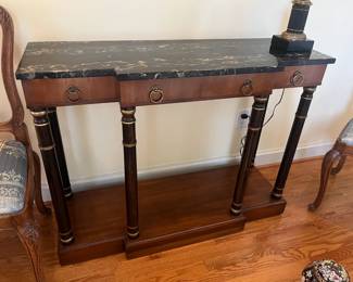 $490. Marble top console table with three drawers. Made by Fine Arts Furniture.  Console is 42 inches wide by 15 inches deep by 31.5 inches high great piece for an entry. Available for online purchase per the instructions on the sale details page, pickup is during in-person shopping hours.