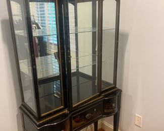 $320. Hand painted antique asian influence glass display cabinet.    The cabinet measures 32 inches wide by 16 inches deep by 66.5 inches high.   Available for online purchase per the instructions on the sale details page, pickup is during in-person shopping hours.