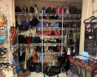 Designer scarves and bags available for purchase during in-person shopping on Friday and Saturday.