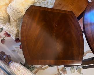 close-up of the beautiful top with inlaid detailing around the rim of the smaller nesting table.