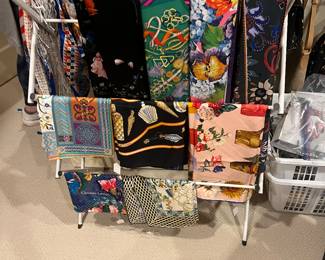 Designer scarves available for purchase during in-person shopping on Friday and Saturday.