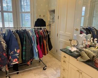 Collectibles, towels and clothing available for purchase during in-person shopping on Friday and Saturday