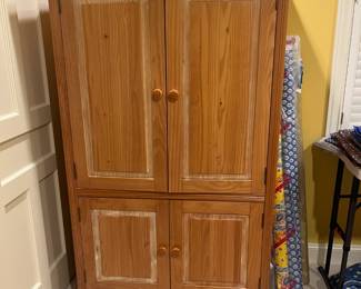 $140. Shaker style plain wood armoire 39.25 wide by 24 deep by 71 inches high.  Available for online purchase per the instructions on the sale details page, pickup is during in-person shopping hours.