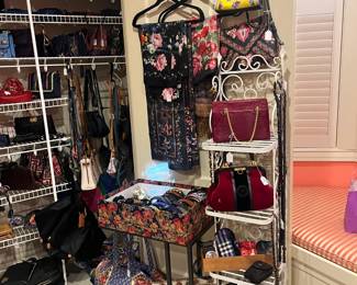 Designer scarves and bags available for purchase during in-person shopping on Friday and Saturday.