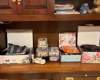 Scarves and other items available for purchase during in-person shopping on Friday and Saturday.