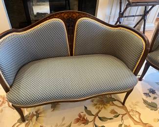 $990.   Antique wood frame with beautiful back detailing settee. sold with a matching barrel side chair.  Will entertain separating them if we have interest in both separately.  The settee measures 49 inches wide by 24 inches deep by 33 inches high.  Available for online purchase per the instructions on the sale details page, pickup is during in-person shopping hours.