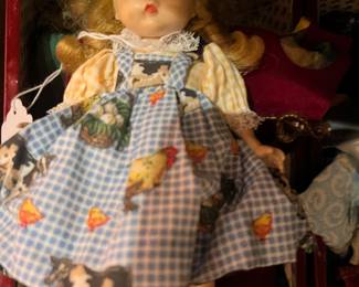 Vintage Madame Alexander "Alex" dolls with their clothing and carrying case. available for purchase during in-person shopping on Friday and Saturday.