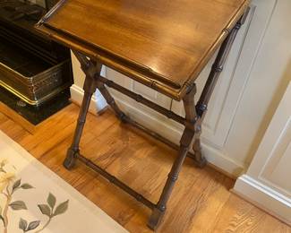  $140. Beautiful wooden bookstand.  it doesn’t fold down But it has two different heights. As shown it is 22.75 inches wide by 17.5 inches deep by 38.5 inches high a small adjustment will take it to 36.5 inches high. Available for online purchase per the instructions on the sale details page, pickup is during in-person shopping hours.