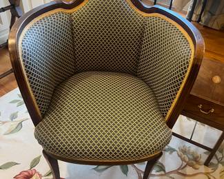 A photo of the chair being sold with the antique settee.  if dimensions are 26.5 inches wide by 24 inches deep by 33 inches high.