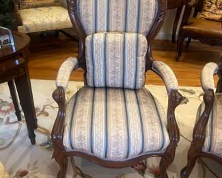 $680. Pair of custom upholstered carved wood frame fauteuils.  each chair measures 25 inches wide by 26 inches deep by 41.5 inches high.  Available for online purchase per the instructions on the sale details page, pickup is during in-person shopping hours.