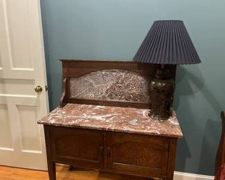 $260 antique marble top wash stand 42 inches wide by 18 inches deep by 48 inches high. Available for online purchase per the instructions on the sale details page, pickup is during in-person shopping hours.