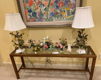 $280. Wood base with glass inset console table.  58.75 x 13.75 x 24.75".  Lamps and collectibles for in person shopping only.  Console is available for online purchase per the instructions on the sale details page, pickup is during in-person shopping hours.