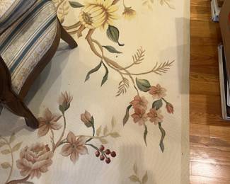 another view of the beautiful rug with its botanical scene