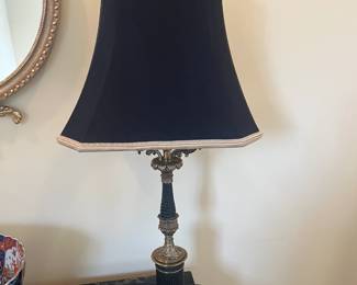 $200. Black and brass lamp on a marble base. 33 inches high.  Available for online purchase per the instructions on the sale details page, pickup is during in-person shopping hours.