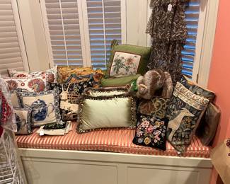 Throw pillows available for purchase during in-person shopping on Friday and Saturday.