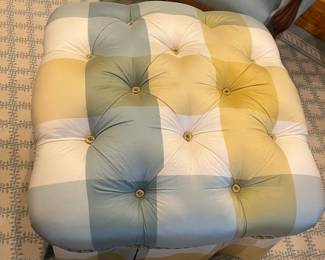 close-up of the fabric and the tufting.