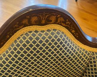 A close-up update detail detailing on both pieces along the wood trim at the top of each piece.