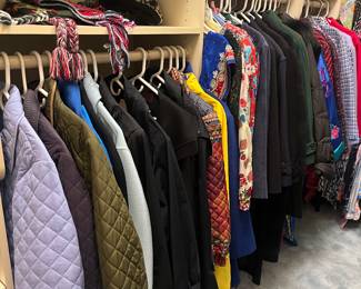 Designer and branded clothing available for purchase during in-person shopping on Friday and Saturday.  Sizes range from medium to xl