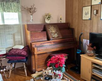 Upright piano with wooden keys