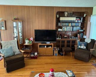 1960s rocking/swivel chairs; curio cabinet; ottoman; TV; TV stand; books; vinyl records