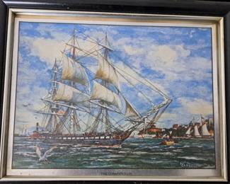 "The Constitution" among various framed ship prints