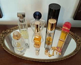 Perfume bottles and mirrored tray