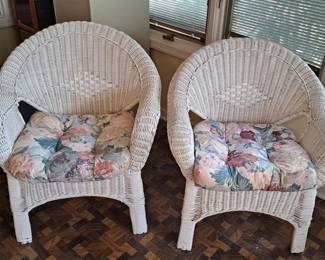Pair of white wicker chairs