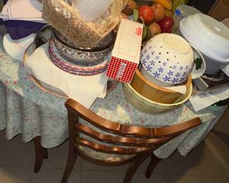 Pretty Kitchen table underneath lots of stuff.. very clean, with pads